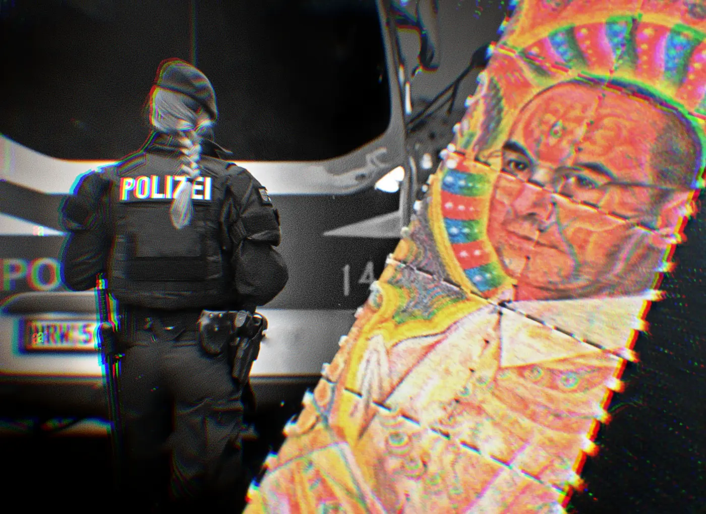 Back view of a German police officer in tactical gear standing beside a police car, with a colorful, geometric sculpture in the foreground.