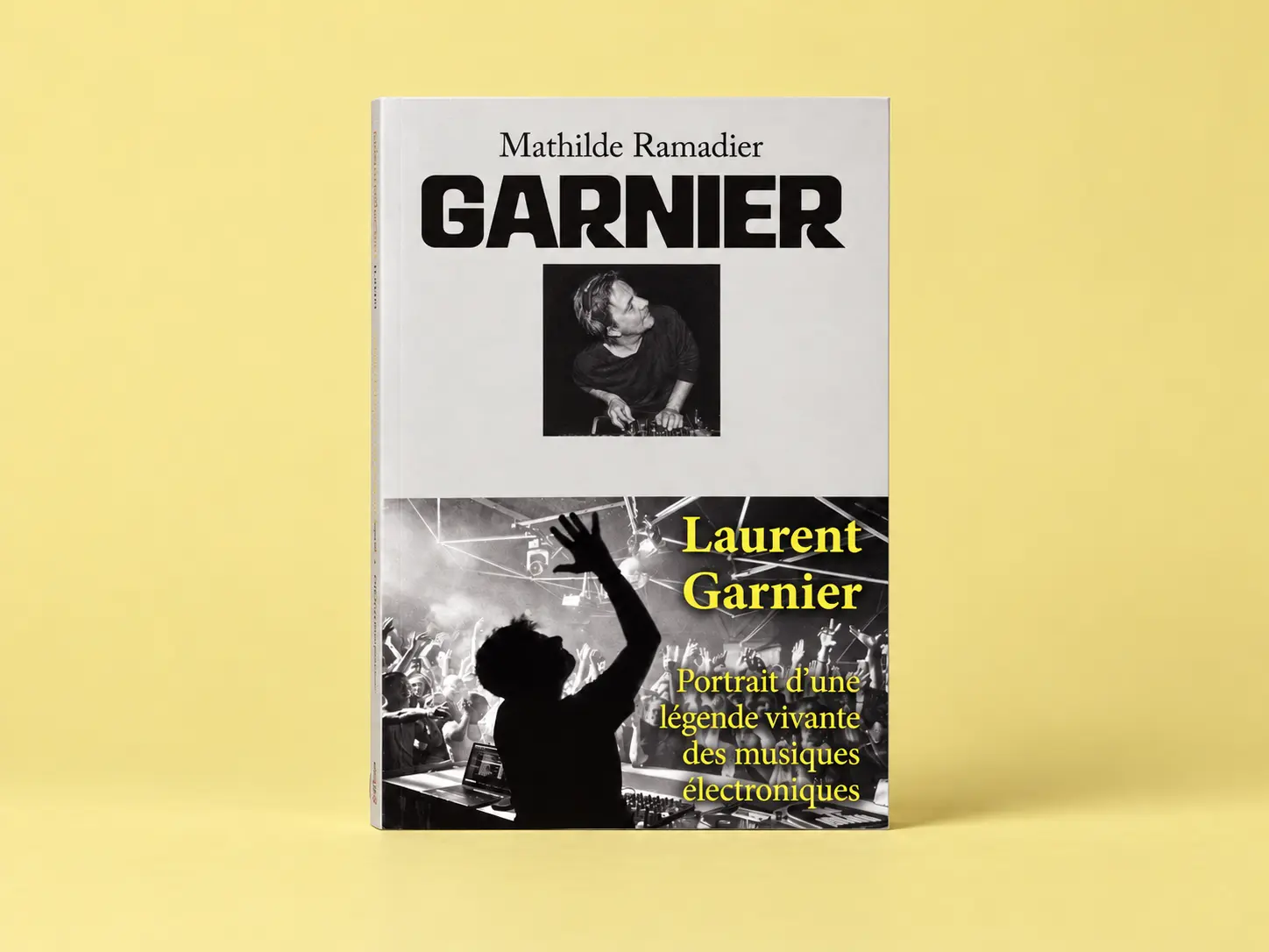 Book cover for Laurent Garnier: Portrait d'une légende vivante des musiques électroniques, featuring a DJ photo and a cheering crowd.